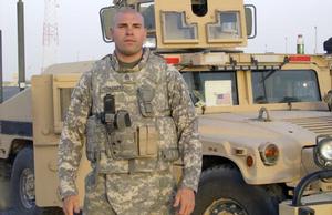 An American soldier wearing a new Improved Outer Tactical Vest.